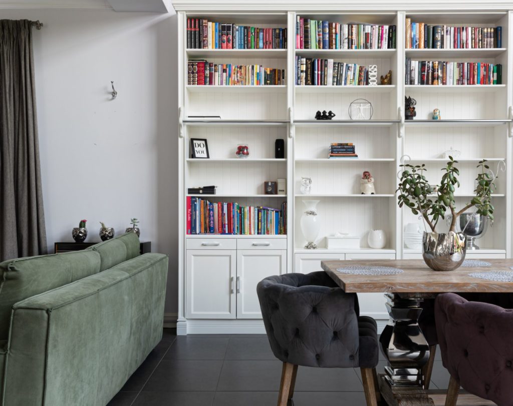 A built-in bookcase enhances interior design.