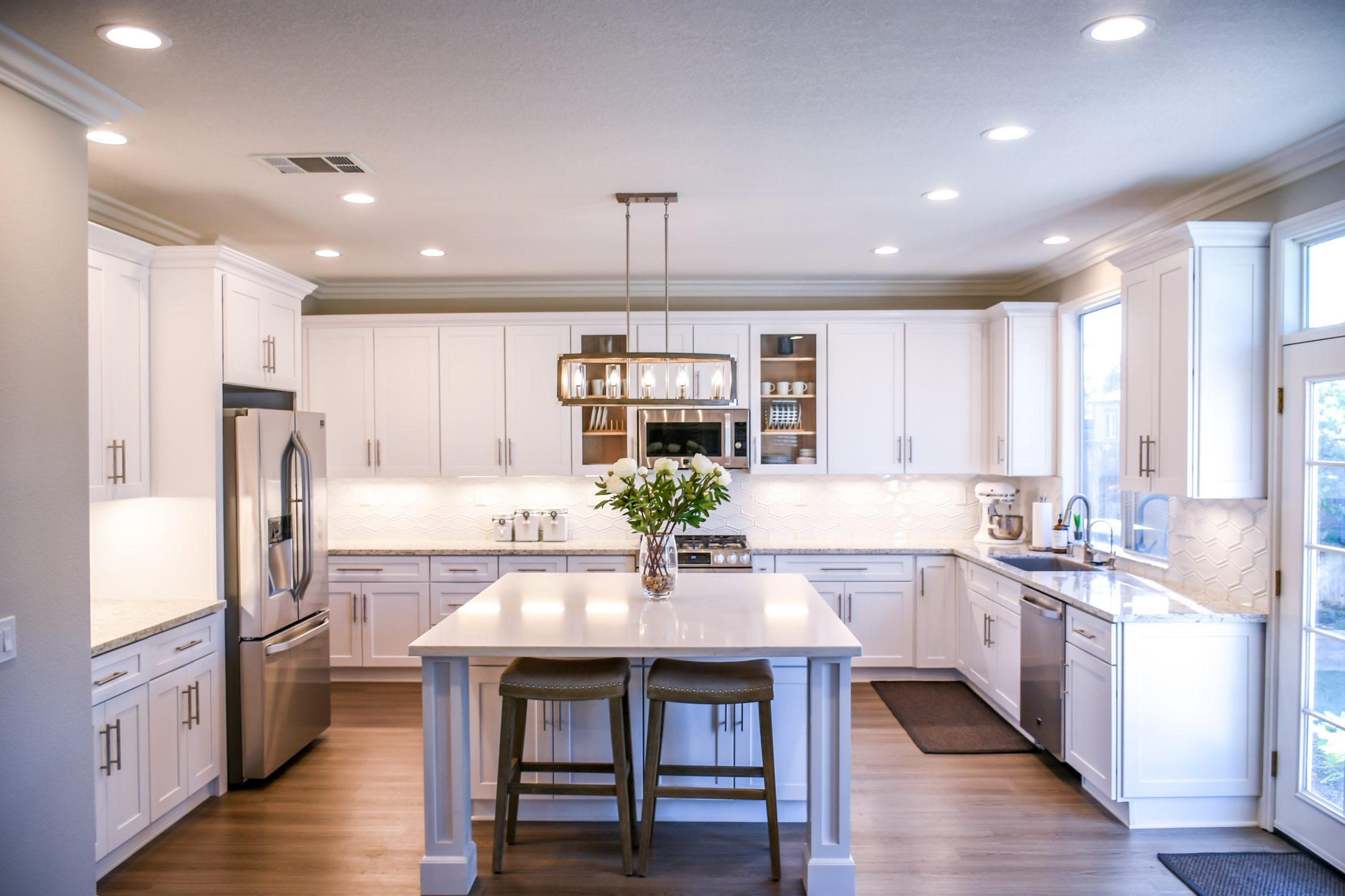 Decluttered kitchens with clean, white lines are a buyer's dream